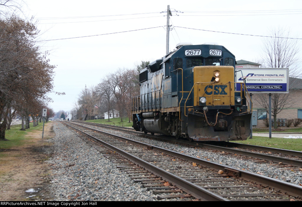 Y121 sits on Track 1 well back from the signals as it waits for Q326